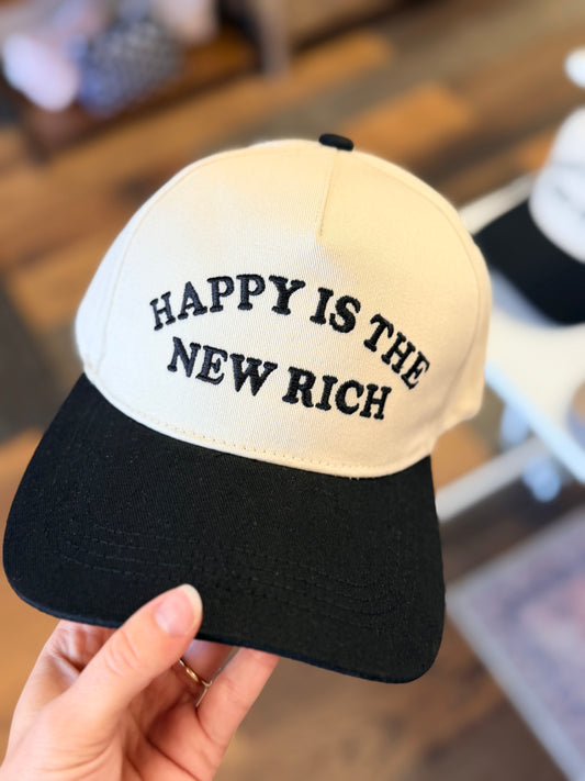 Happy is the new rich hat